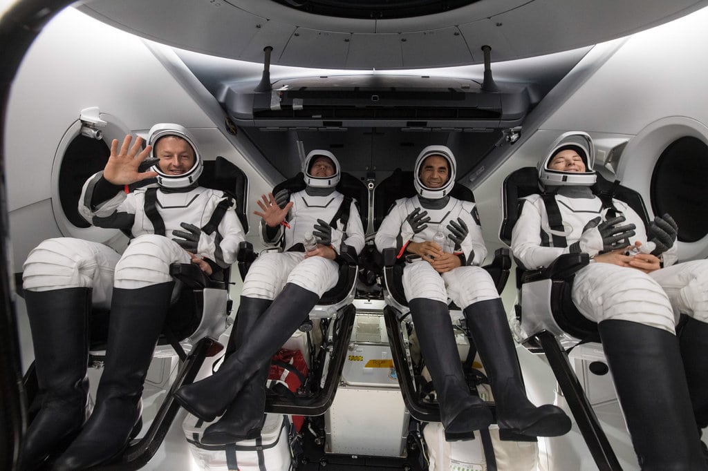 People testing the seats and suits for SpaceX's Dragon capsule.
